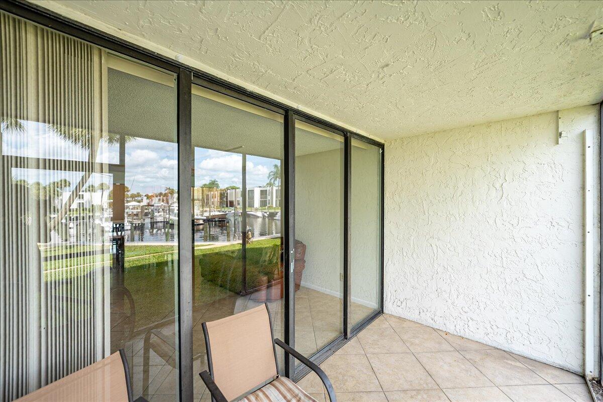1950 Southwest Palm City Road, Unit 5109 Stuart, FL 34994 - Photo 6 of 14 Back Screened patio