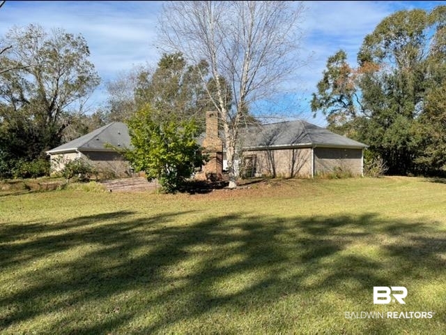 8356 Gayfer Rd Extension Fairhope, AL 36532 - Photo 4 of 40 View of green lawn