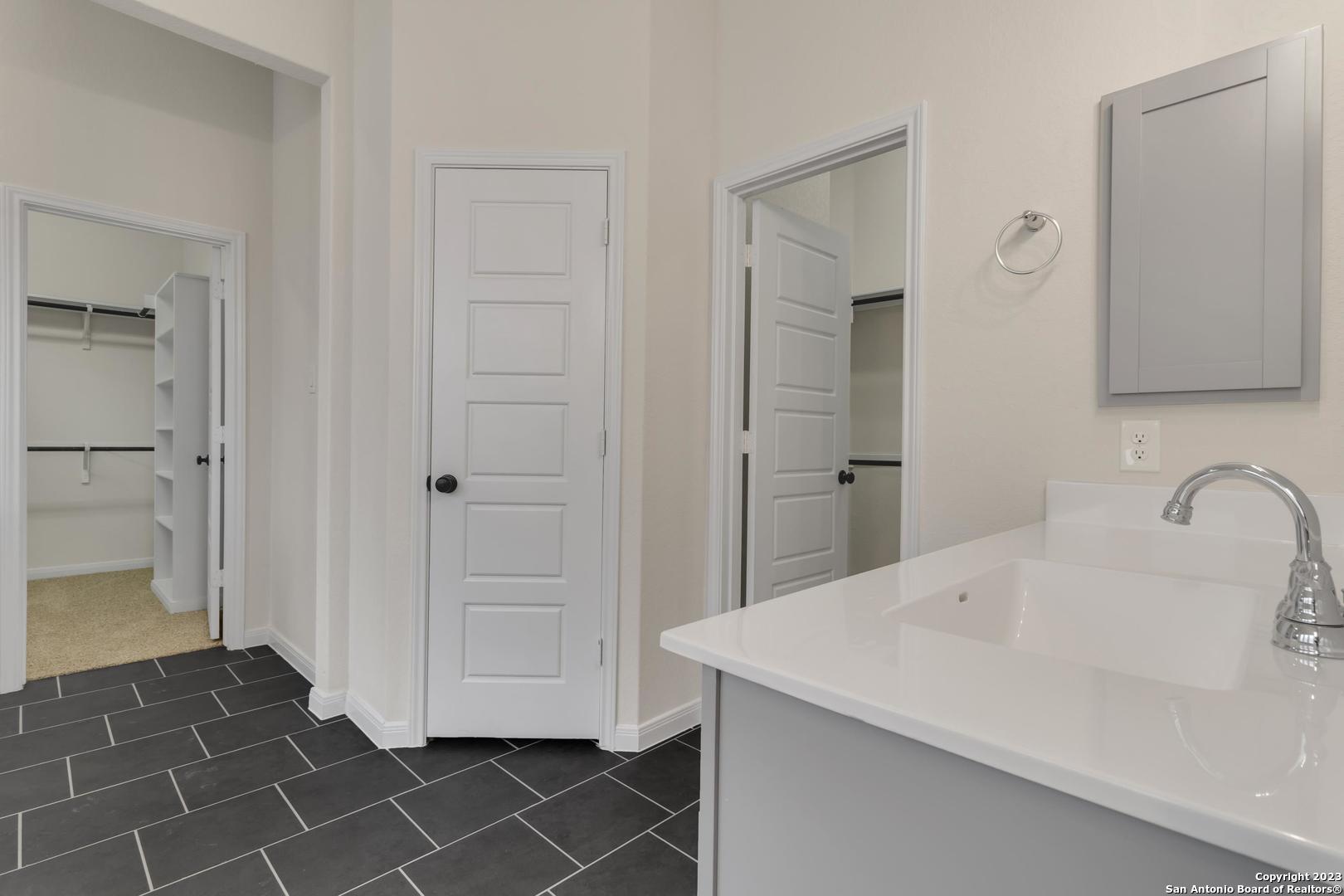 104 Matador Boerne, TX 78006 - Photo 16 of 33 a bathroom with a sink and a mirror