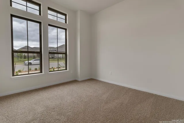 an empty room with windows