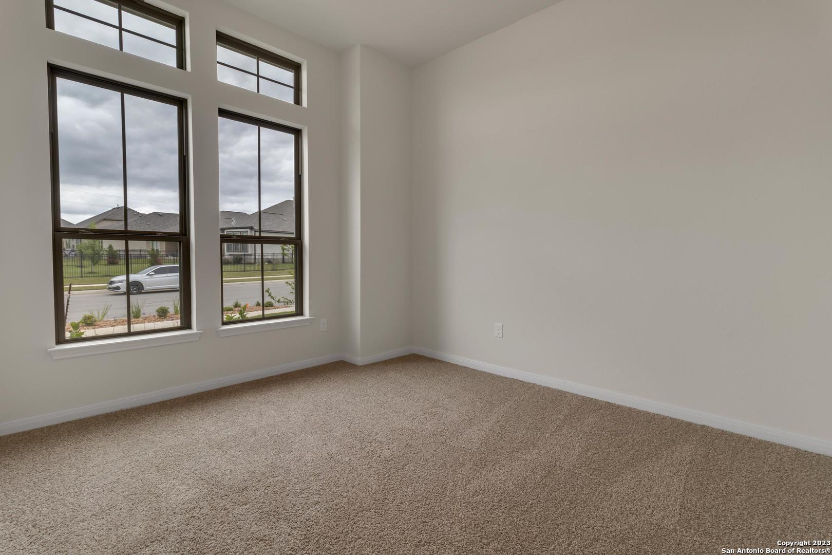 104 Matador Boerne, TX 78006 - Photo 30 of 33 an empty room with windows