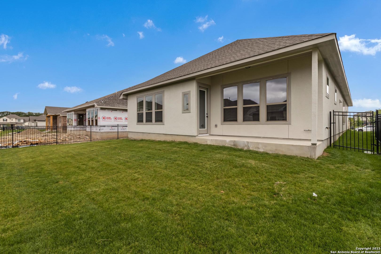104 Matador Boerne, TX 78006 - Photo 31 of 33 a view of a house with a backyard