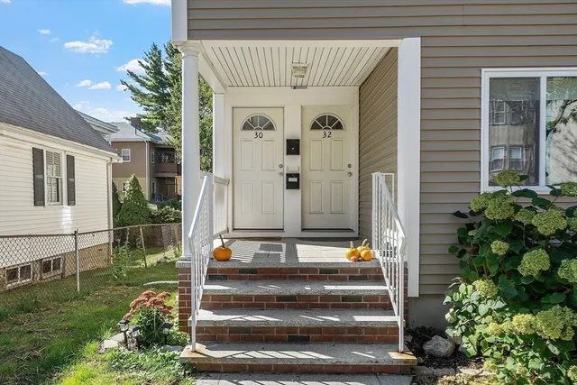 a view of entryway with a front door