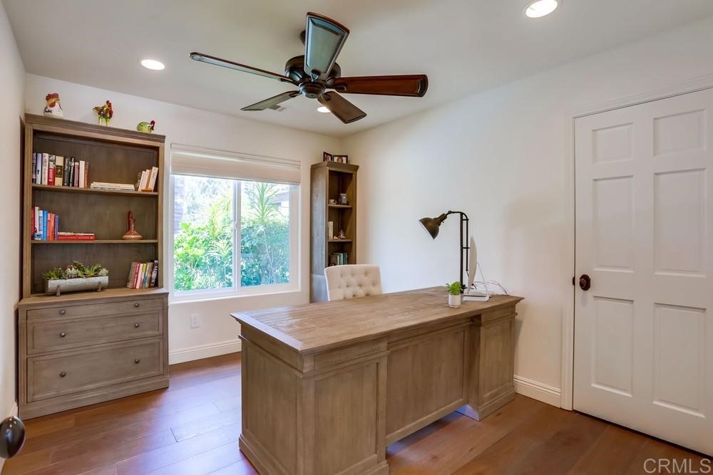 1283 Rancho Encinitas Drive Encinitas, CA 92024 - Photo 12 of 27 a kitchen with a stove a sink and a window