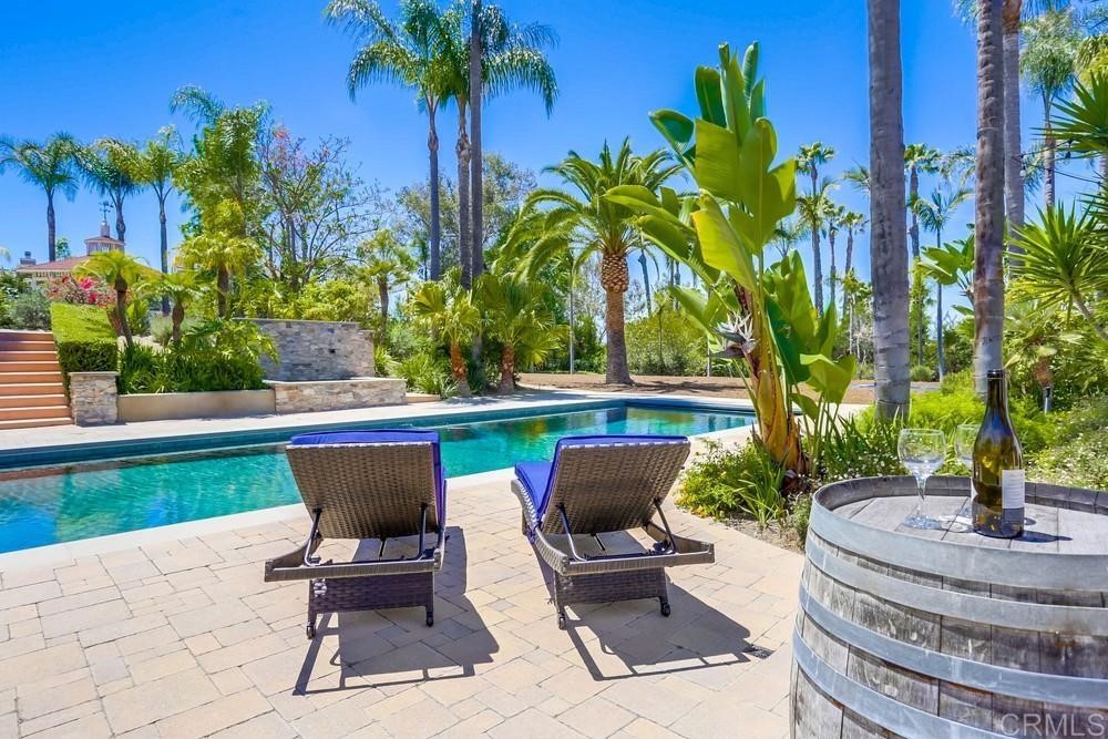 1283 Rancho Encinitas Drive Encinitas, CA 92024 - Photo 2 of 27 a view of a chair and table in the patio