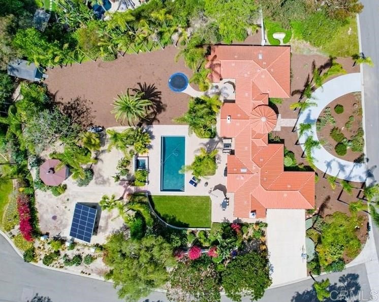 1283 Rancho Encinitas Drive Encinitas, CA 92024 - Photo 25 of 27 an aerial view of a house with a lot of flower plants
