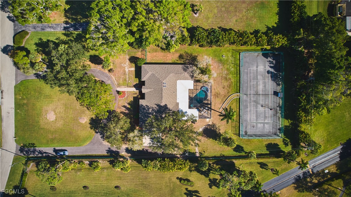 3644 Putter Point Lane Fort Myers, FL 33919 - Photo 3 of 50 an aerial view of a house with a yard swimming pool and outdoor seating