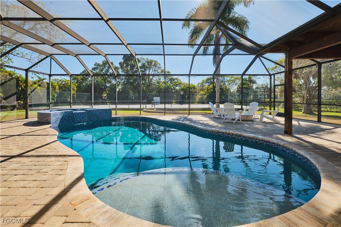 3644 Putter Point Lane Fort Myers, FL 33919 - Photo 41 of 50 a view of a swimming pool with a patio