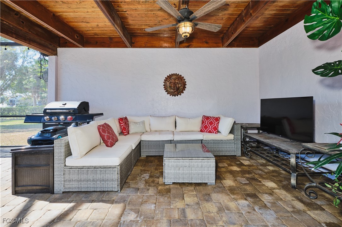 3644 Putter Point Lane Fort Myers, FL 33919 - Photo 43 of 50 a living room with furniture and a flat screen tv