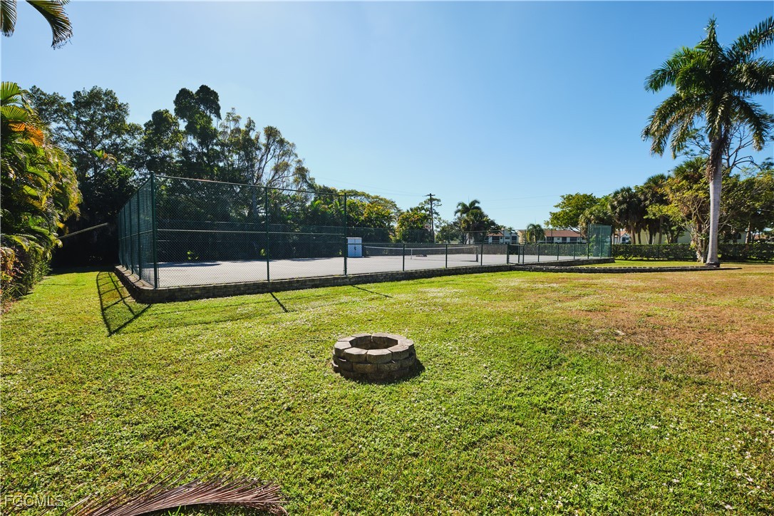 3644 Putter Point Lane Fort Myers, FL 33919 - Photo 45 of 50 a view of a swimming pool with a garden and plants