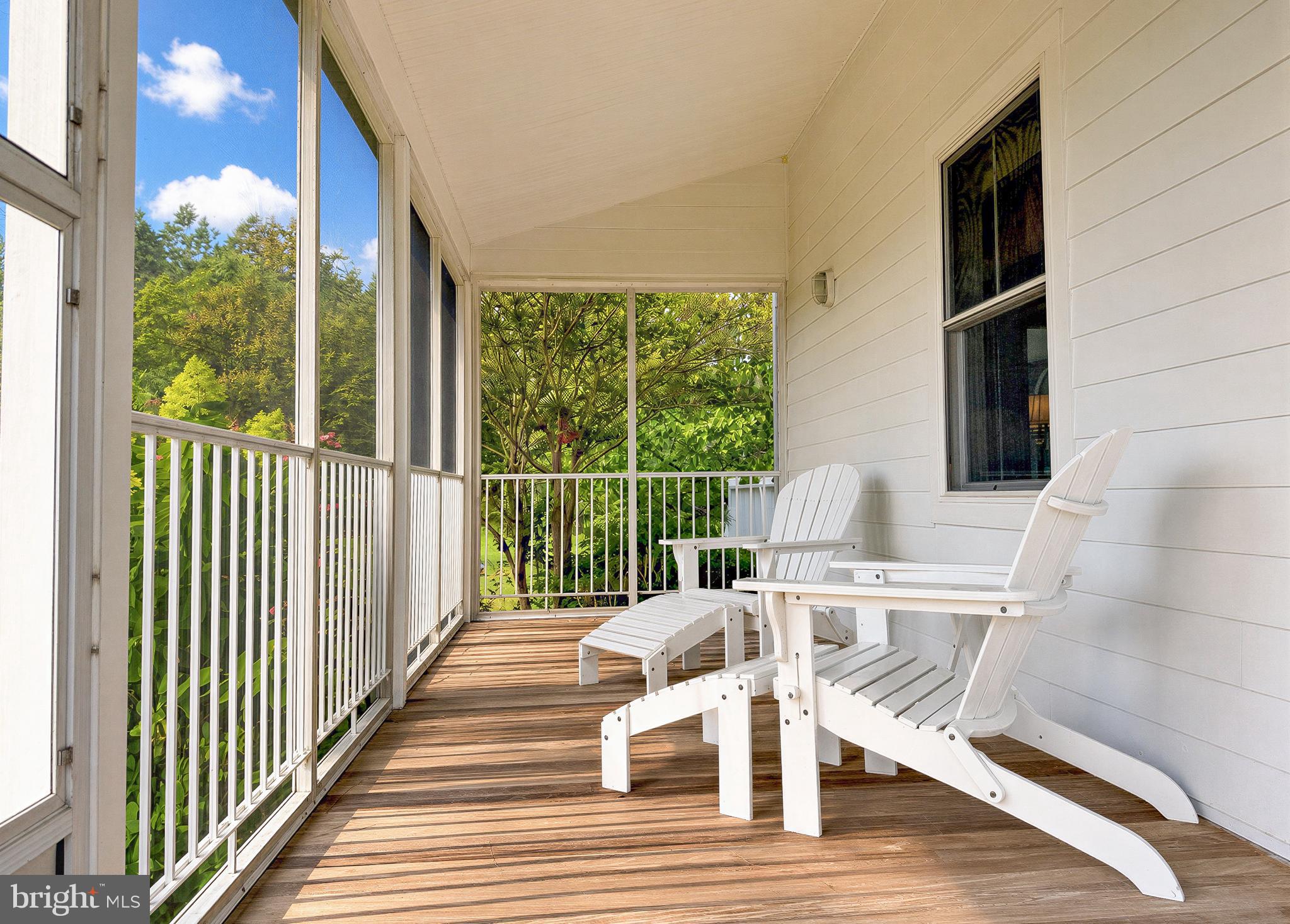 16144 Thomas Road Piney Point, MD 20674 - Photo 35 of 98 Tranquil Wrap-Around Screened Porch with Ipe Deck