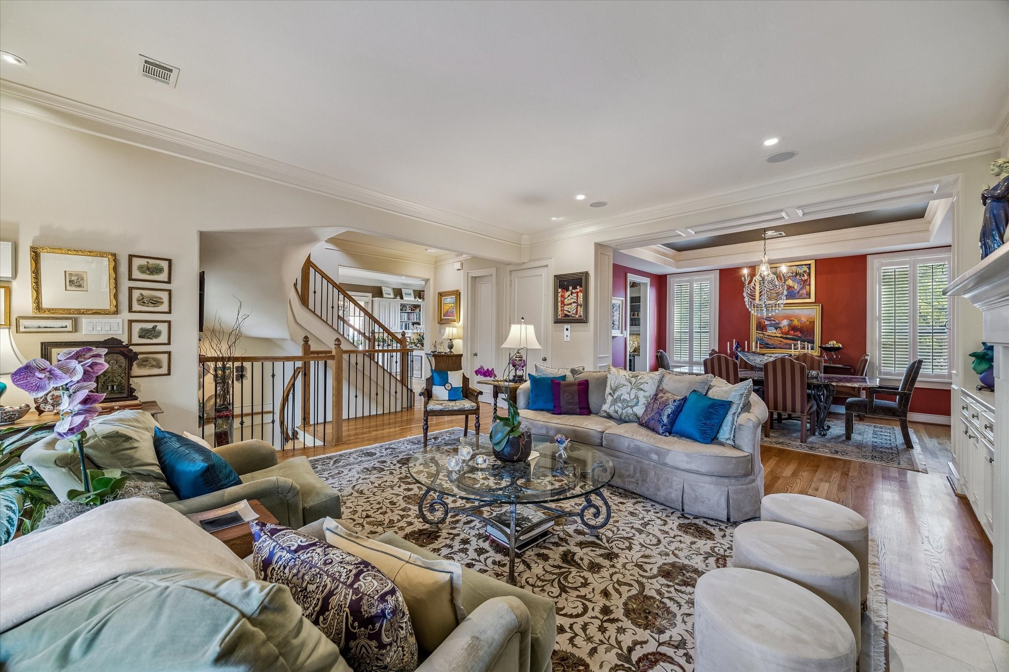 2415 West Main Street Houston, TX 77098 - Photo 20 of 48 Open, flowing living spaces are designed for sophisticated entertaining or quiet relaxation, with natural light pouring in through well placed windows and glass doors.