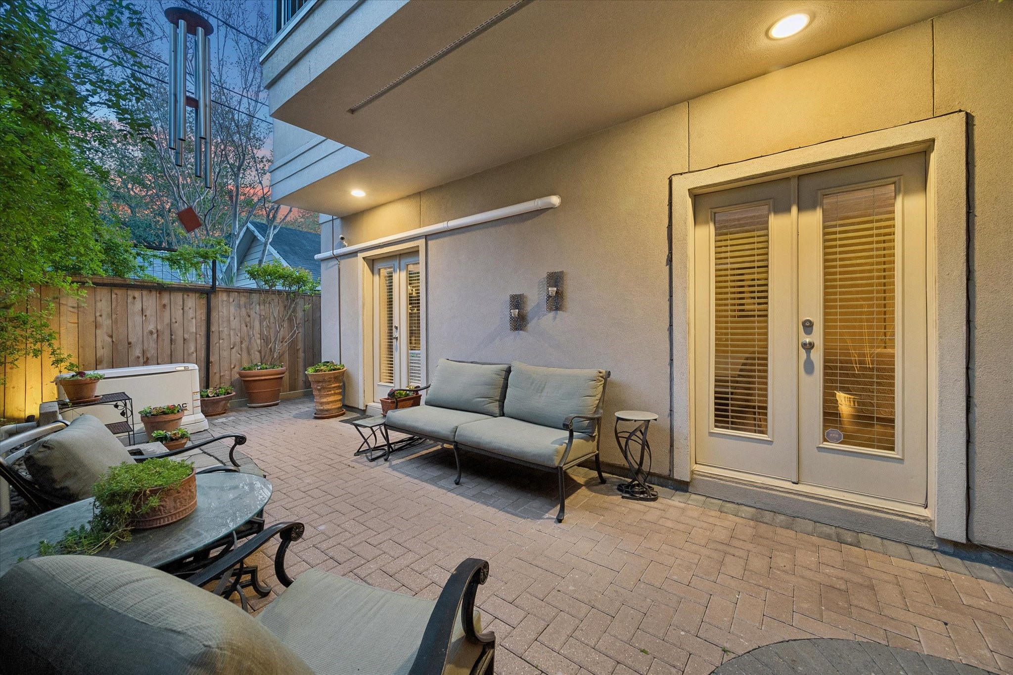 2415 West Main Street Houston, TX 77098 - Photo 42 of 48 This perspective showcases the patio’s impressive spaciousness, offering ample room for relaxing, dining, and entertaining.