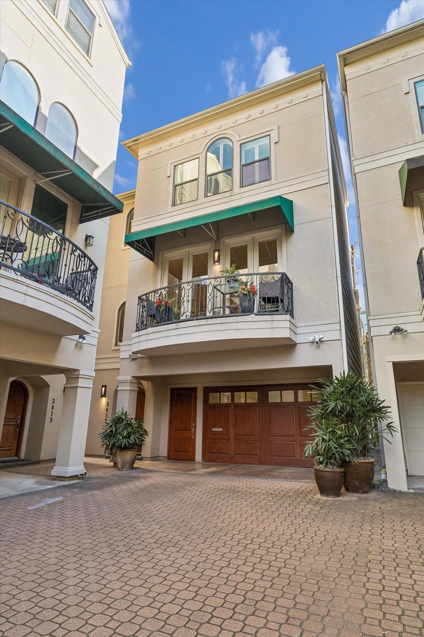 2415 West Main Street Houston, TX 77098 - Photo 10 of 48 Front Elevation... The home’s universal design ensures harmonious mobility & ease of use, all subtly integrated to preserve its elevated aesthetic.