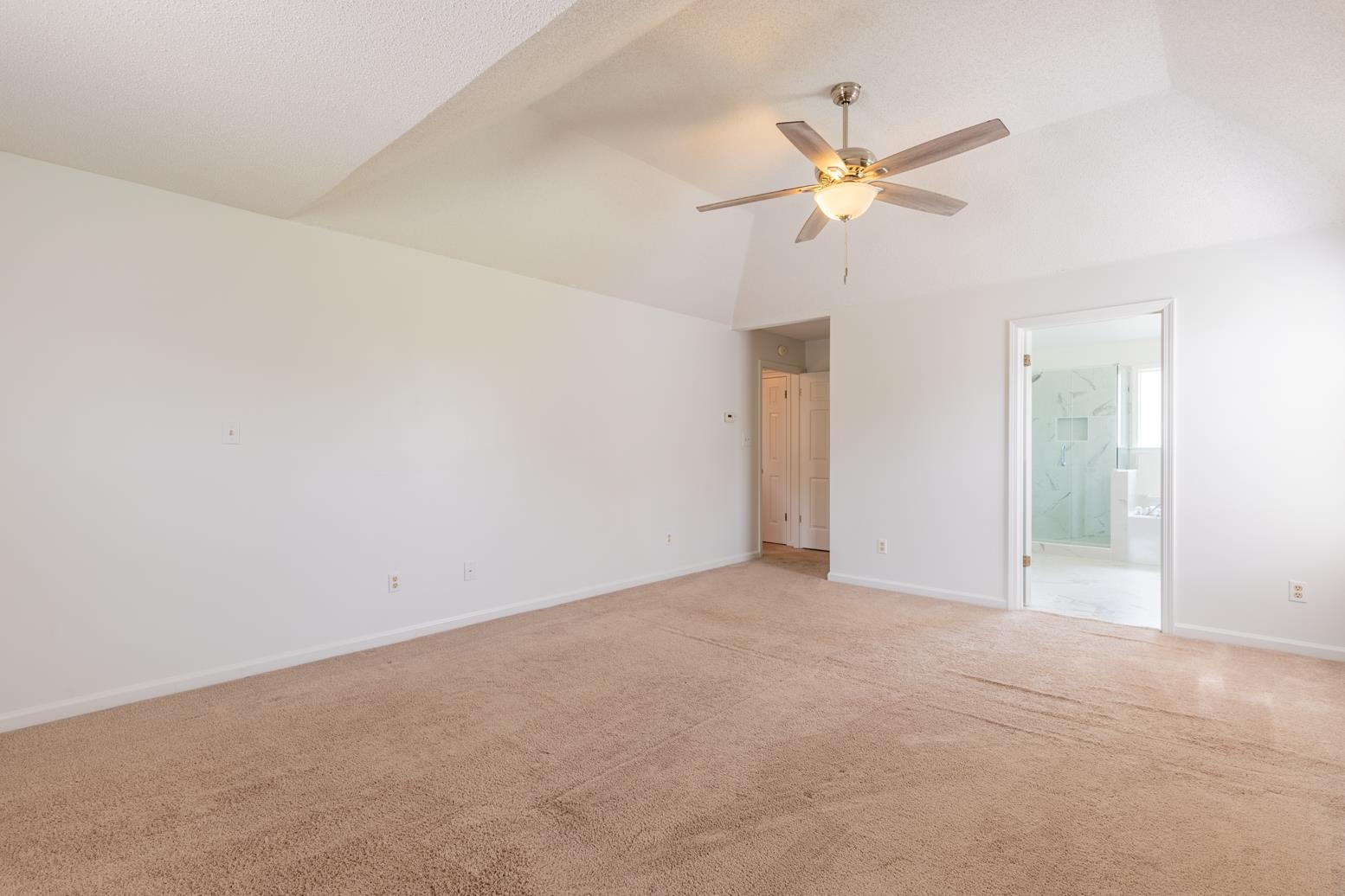 251 Cross Point Cove Collierville, TN 38017 - Photo 15 of 29 a view of a livingroom with a ceiling fan and window