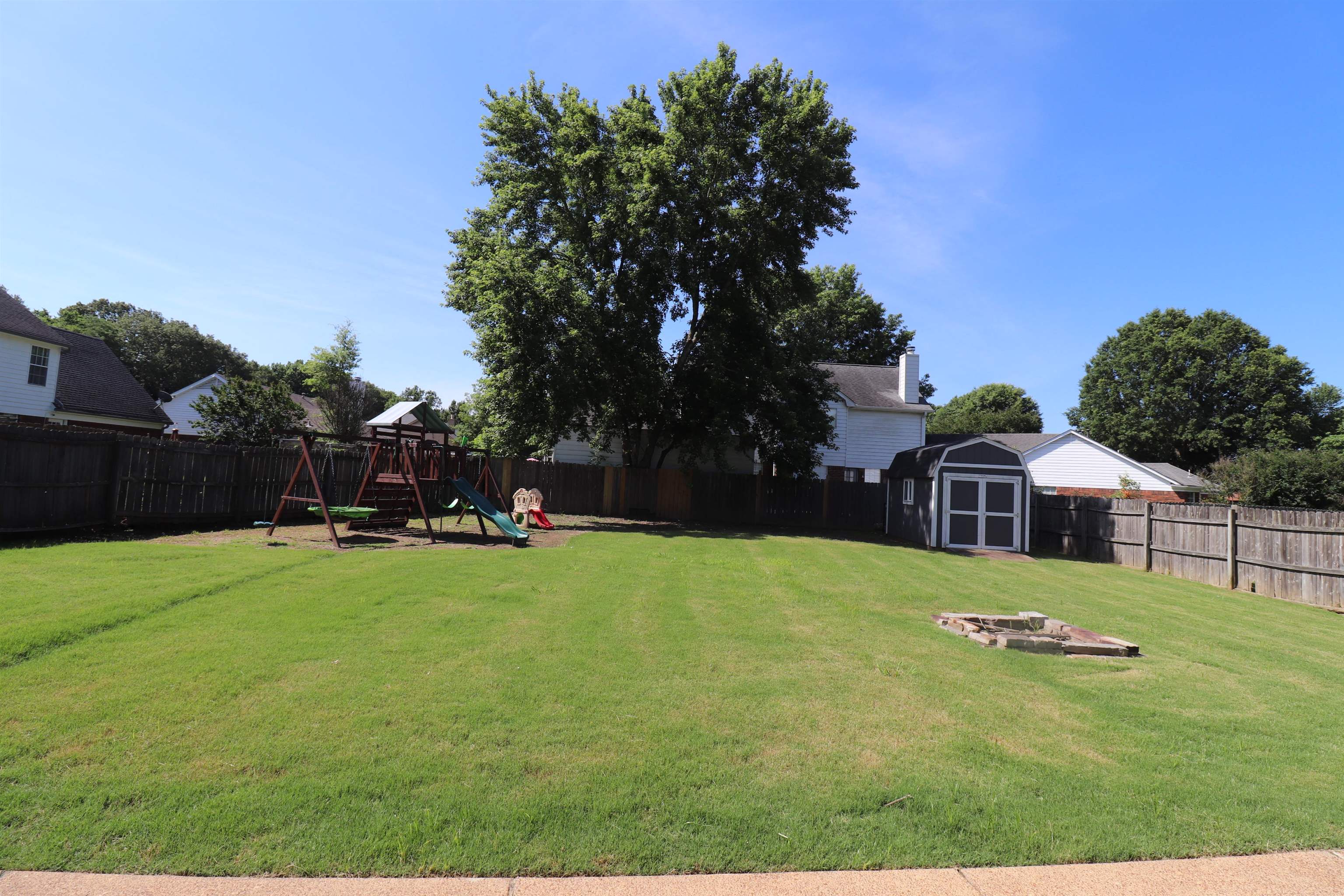 251 Cross Point Cove Collierville, TN 38017 - Photo 26 of 29 a view of a house with back yard