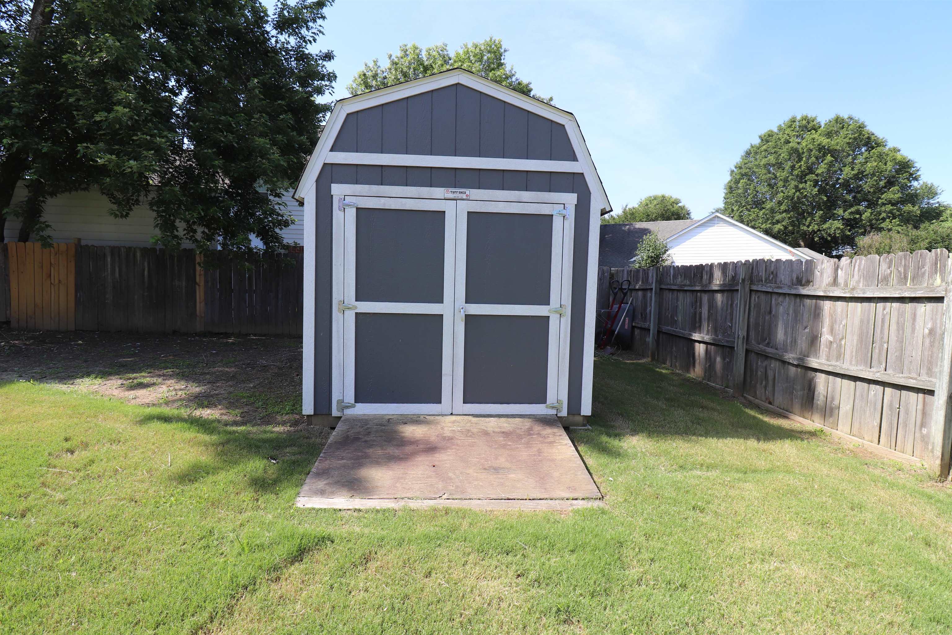 251 Cross Point Cove Collierville, TN 38017 - Photo 27 of 29 a view of backyard with small cabin