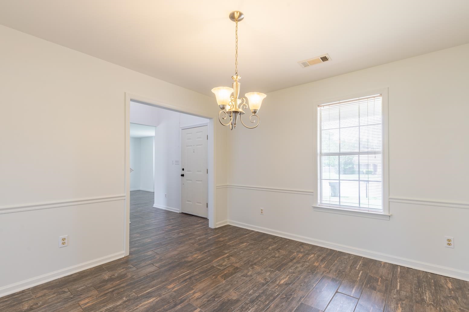 251 Cross Point Cove Collierville, TN 38017 - Photo 5 of 29 a view of a room with wooden floor and windows