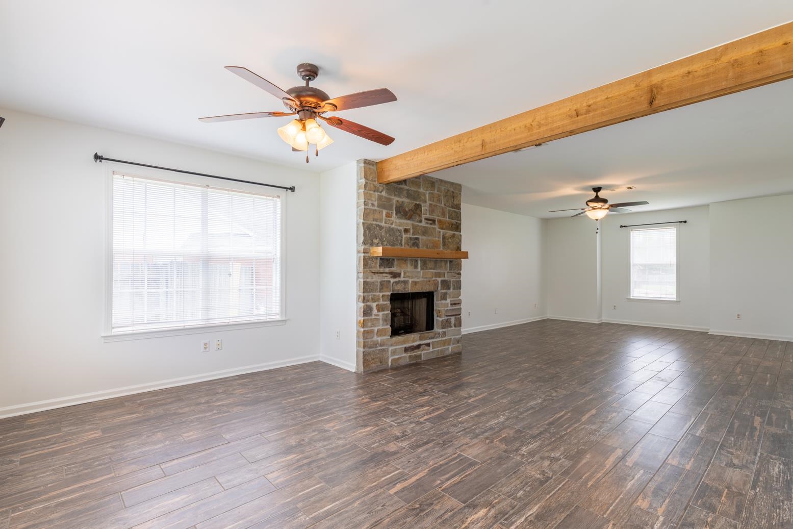251 Cross Point Cove Collierville, TN 38017 - Photo 10 of 29 a view of a livingroom with a ceiling fan and window