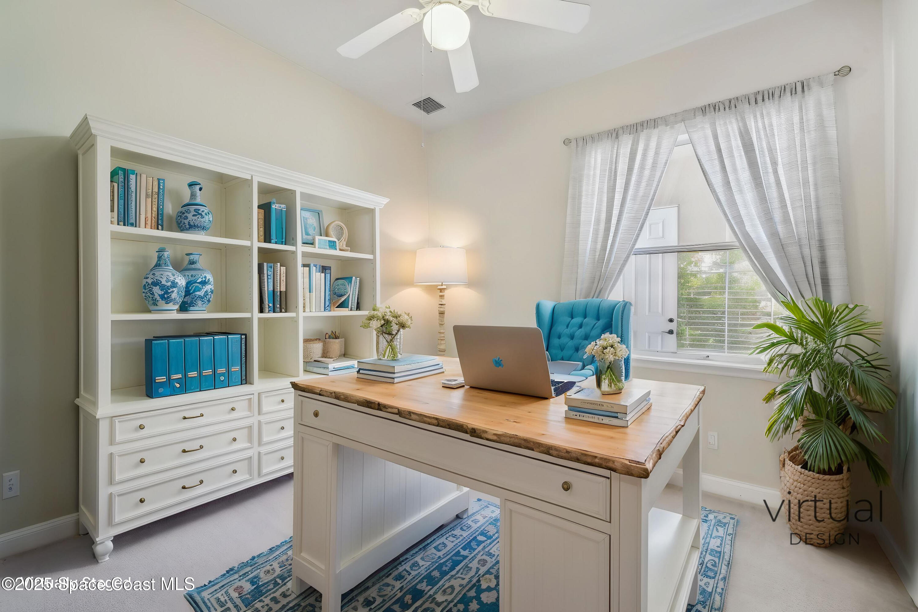 4040 Alamanda Key Drive Melbourne, FL 32901 - Photo 26 of 46 a living room with furniture and a potted plant
