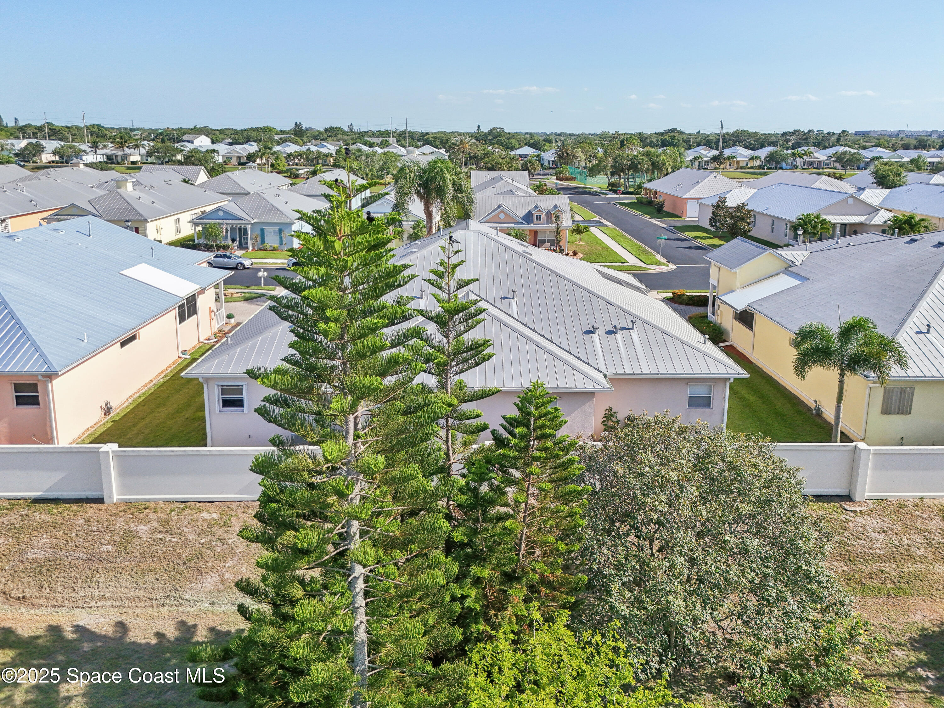 4040 Alamanda Key Drive Melbourne, FL 32901 - Photo 29 of 46 an aerial view of residential houses with outdoor space