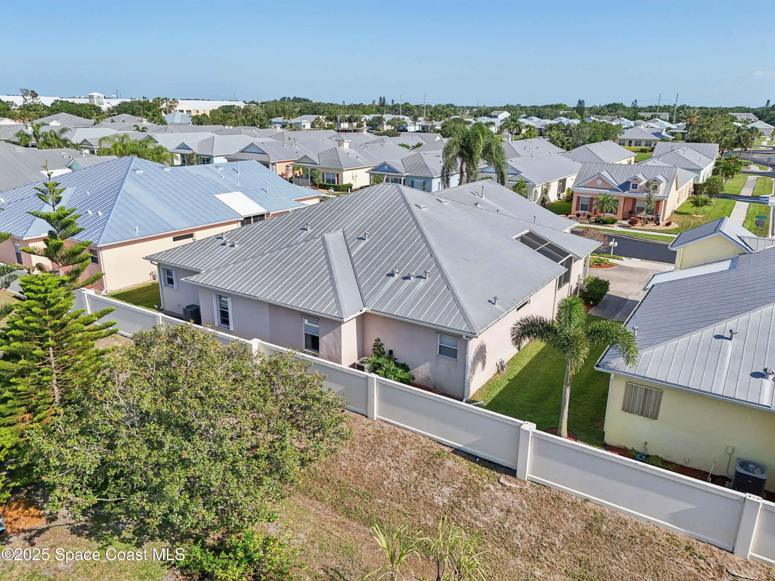 4040 Alamanda Key Drive Melbourne, FL 32901 - Photo 30 of 46 an aerial view of a house with a garden