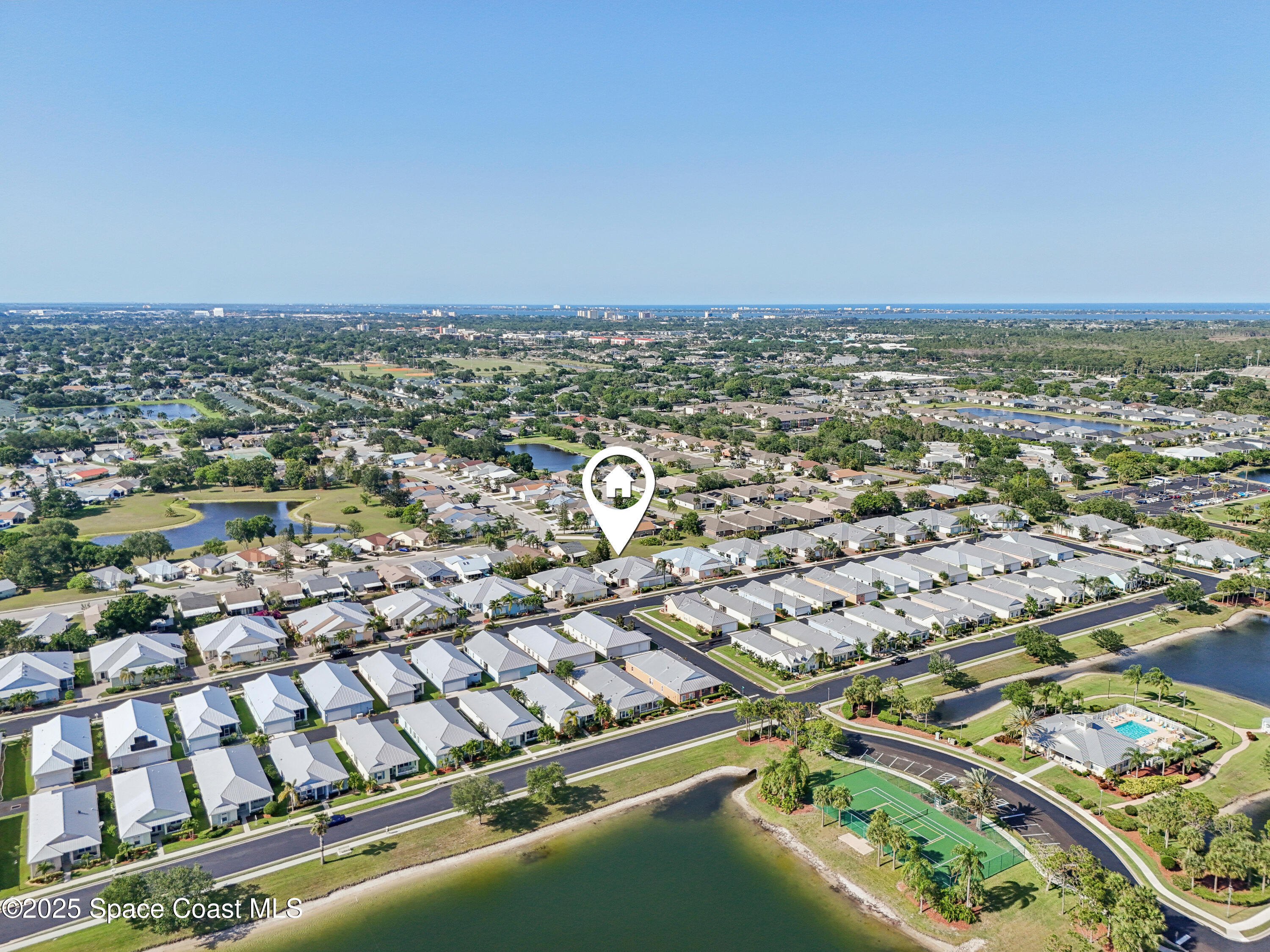 4040 Alamanda Key Drive Melbourne, FL 32901 - Photo 32 of 46 an aerial view of multiple house