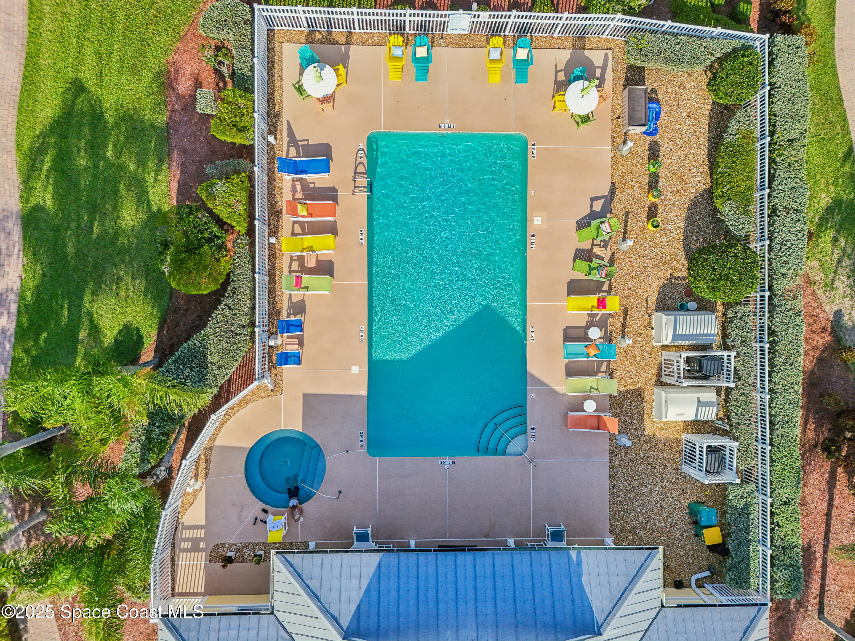 4040 Alamanda Key Drive Melbourne, FL 32901 - Photo 34 of 46 an aerial view of residential house with outdoor space and parking
