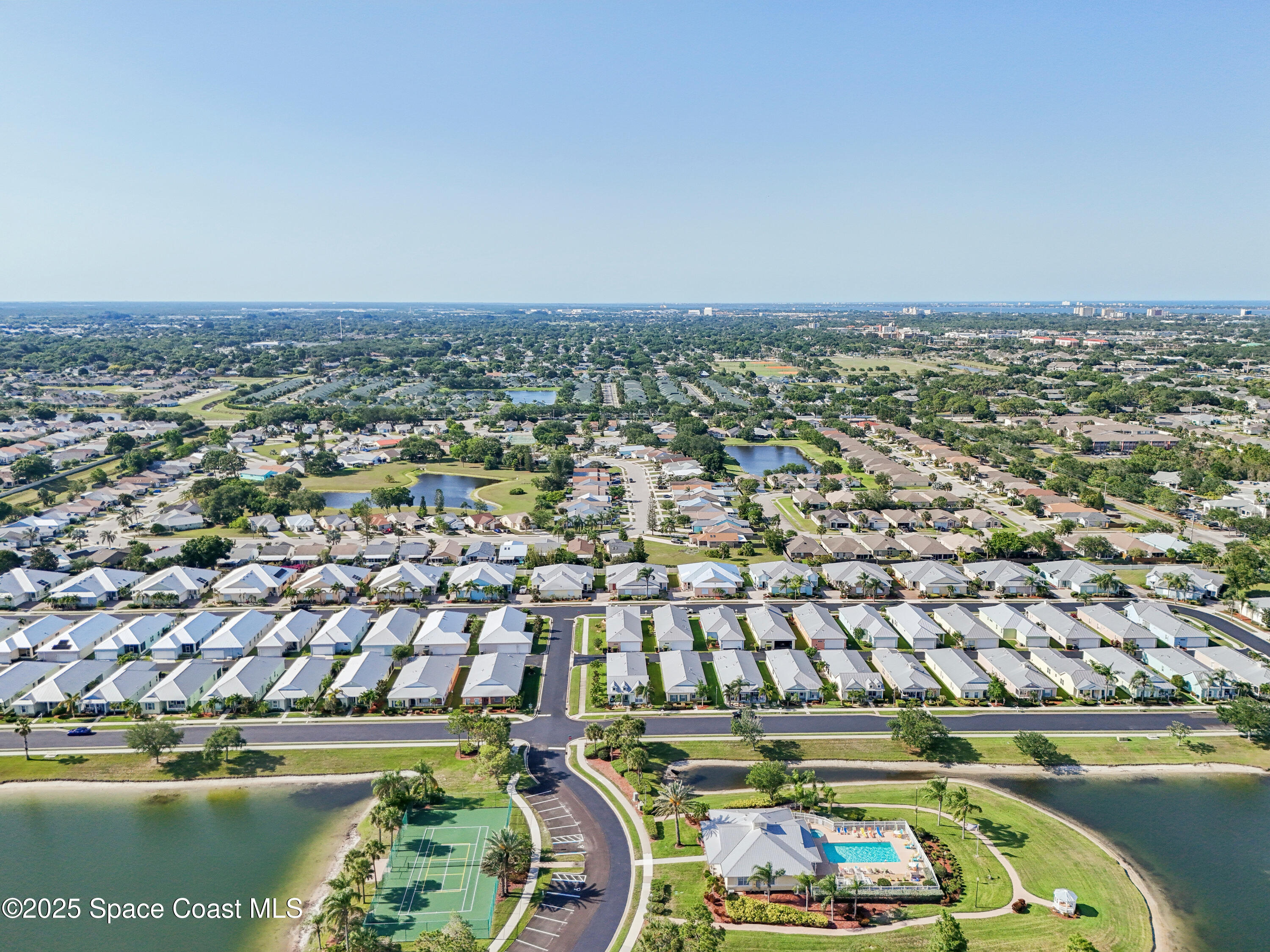 4040 Alamanda Key Drive Melbourne, FL 32901 - Photo 40 of 46 an aerial view of a residential houses with outdoor space