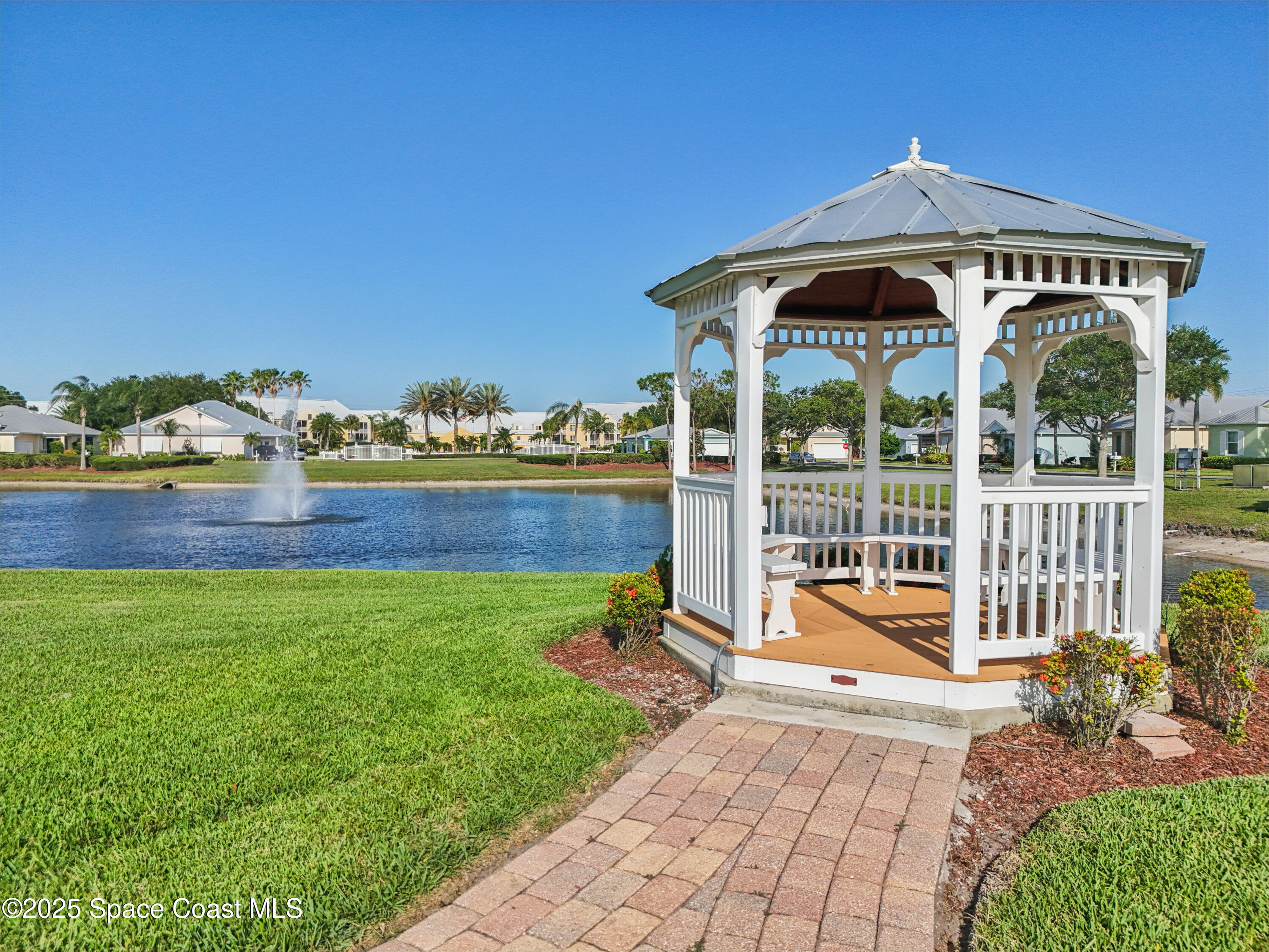 4040 Alamanda Key Drive Melbourne, FL 32901 - Photo 43 of 46 a view of a house with a yard
