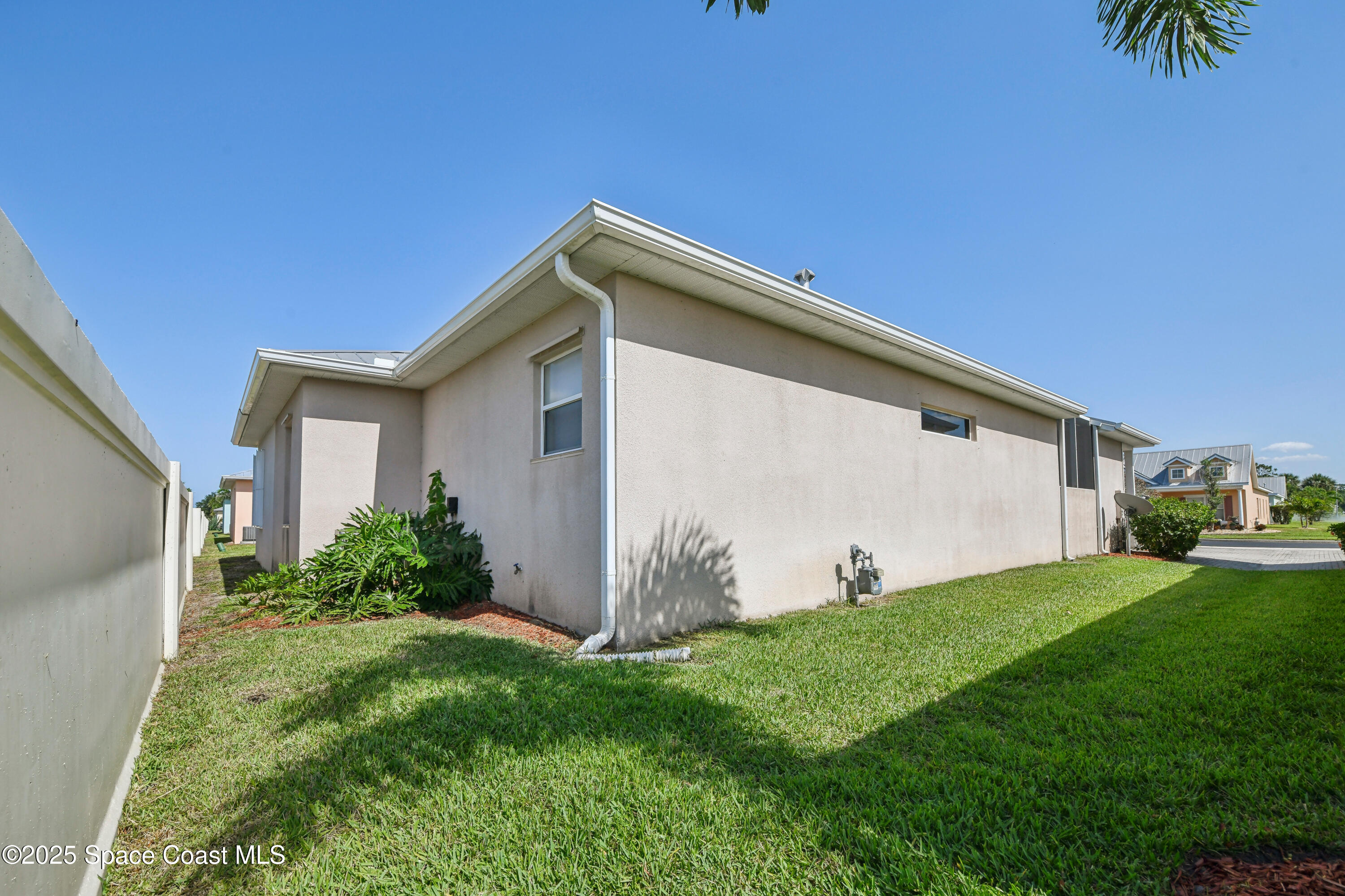 4040 Alamanda Key Drive Melbourne, FL 32901 - Photo 44 of 46 Rear Yard