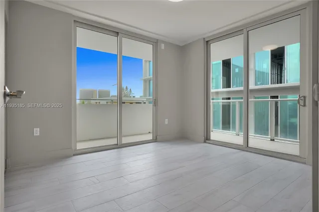 a view of a room with cabinet and a window