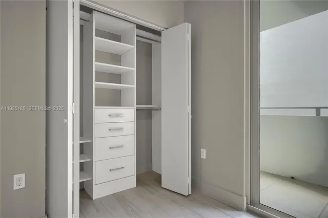 a view of an empty walk in closet