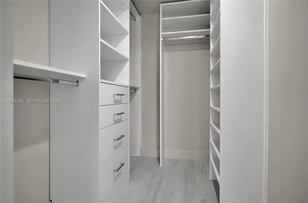 a view of an empty walk in closet