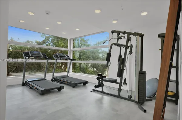 a view of a street with a building in the background