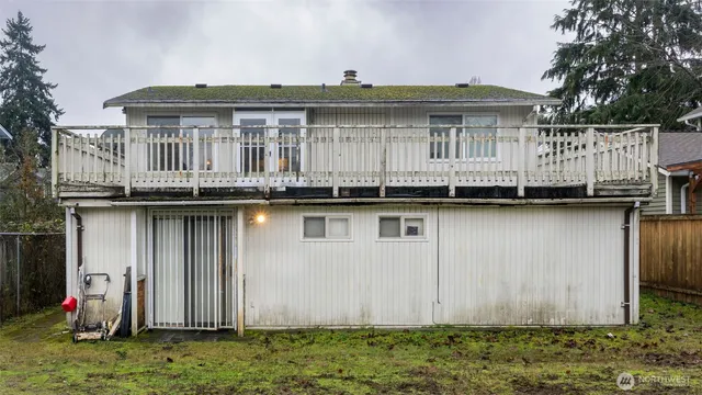 a front view of house with yard barbeque oven and barbeque oven