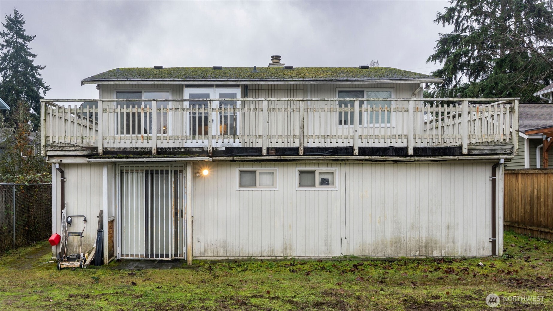 928 North 98th Street Seattle, WA 98103 - Photo 3 of 17 a front view of house with yard barbeque oven and barbeque oven