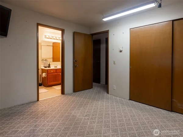 a view of a room with a wardrobe space