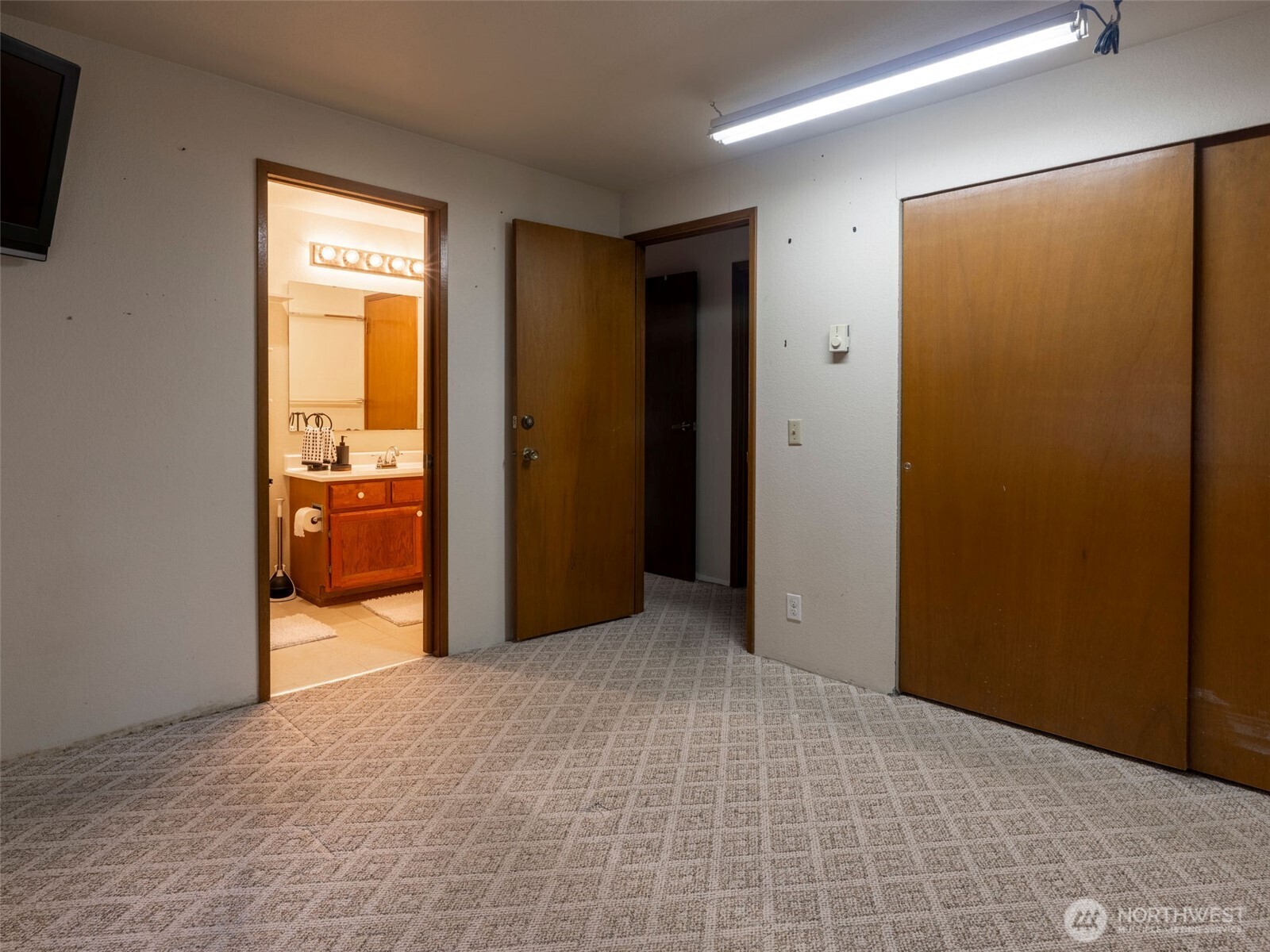 928 North 98th Street Seattle, WA 98103 - Photo 7 of 16 a view of a room with a wardrobe space