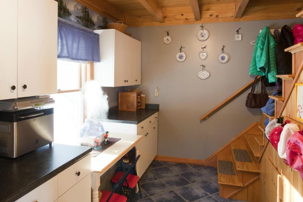 494 Springy Pond Road Ellsworth, ME 04605 - Photo 20 of 34 1st floor pantry leads to loft stairway