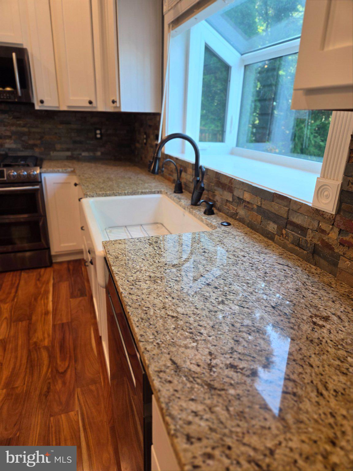 35175 Pheasant Ridge Road Locust Grove, VA 22508 - Photo 28 of 80 Modern kitchen with elegant finishes.