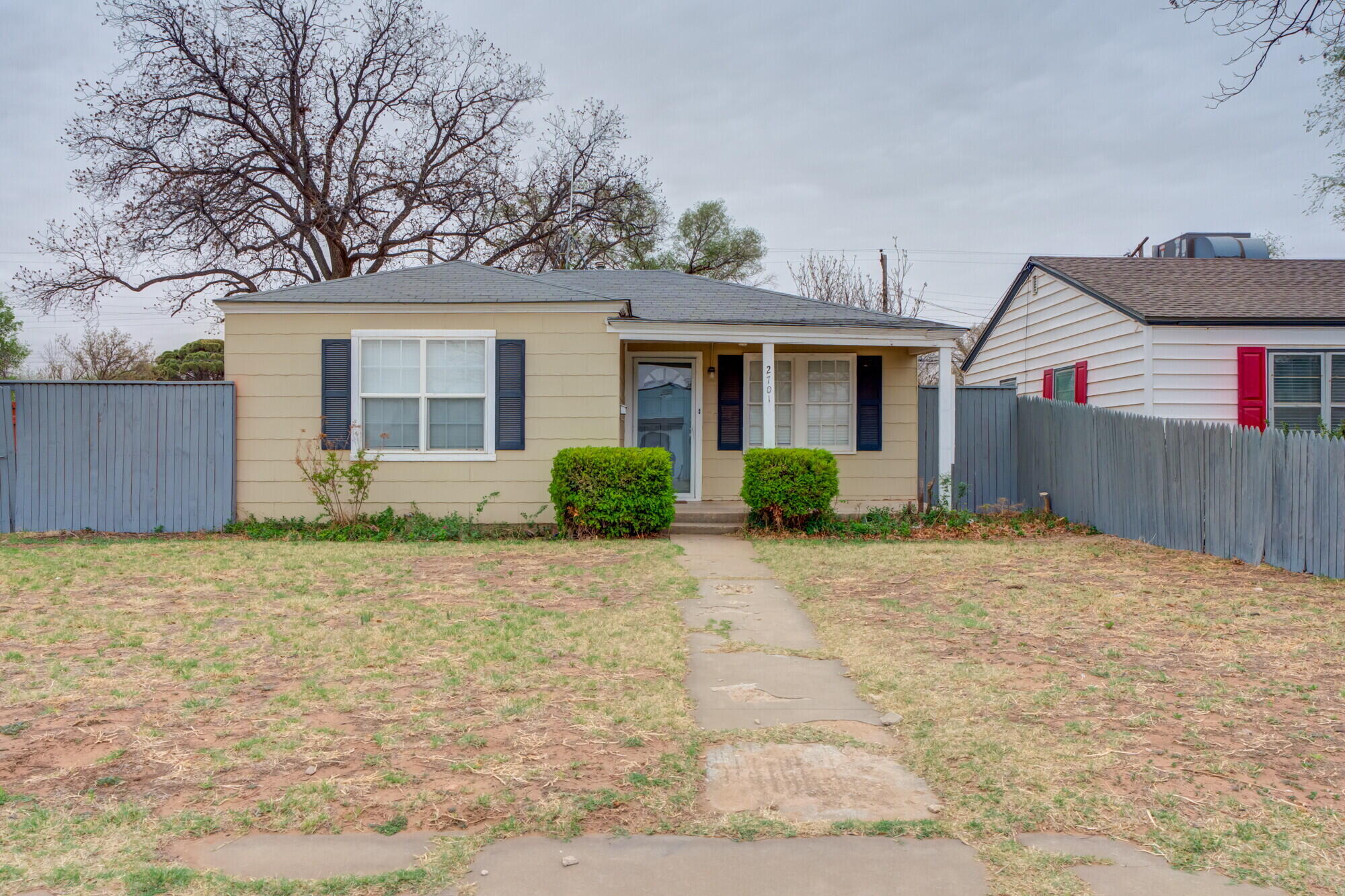 2701 36th Street Lubbock, TX 79413 - Photo 1 of 23 front view of a house with a yard