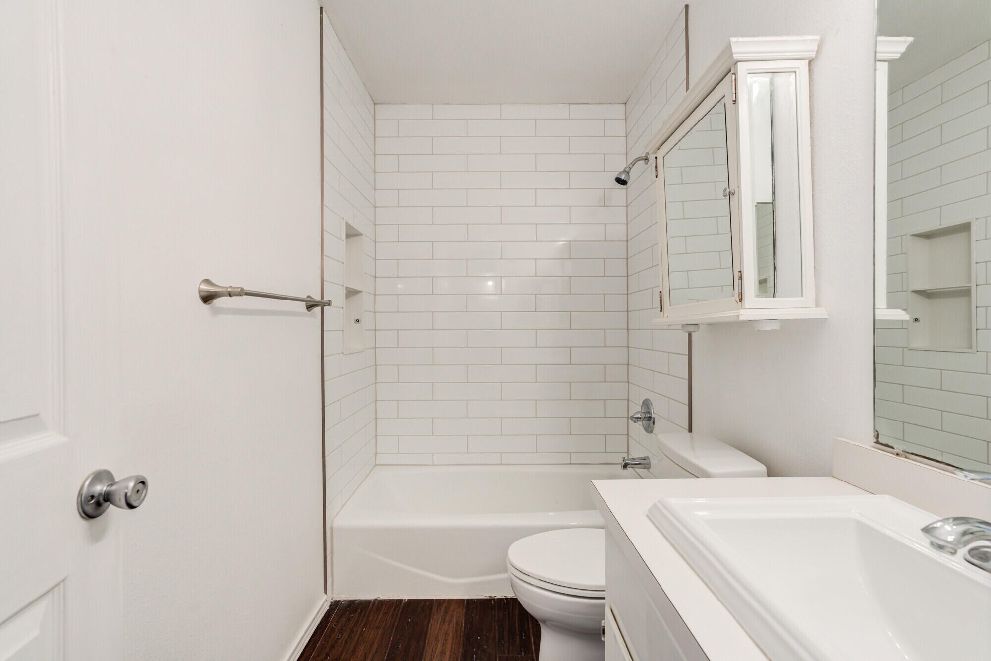2701 36th Street Lubbock, TX 79413 - Photo 15 of 23 a bathroom with a sink toilet vanity and shower