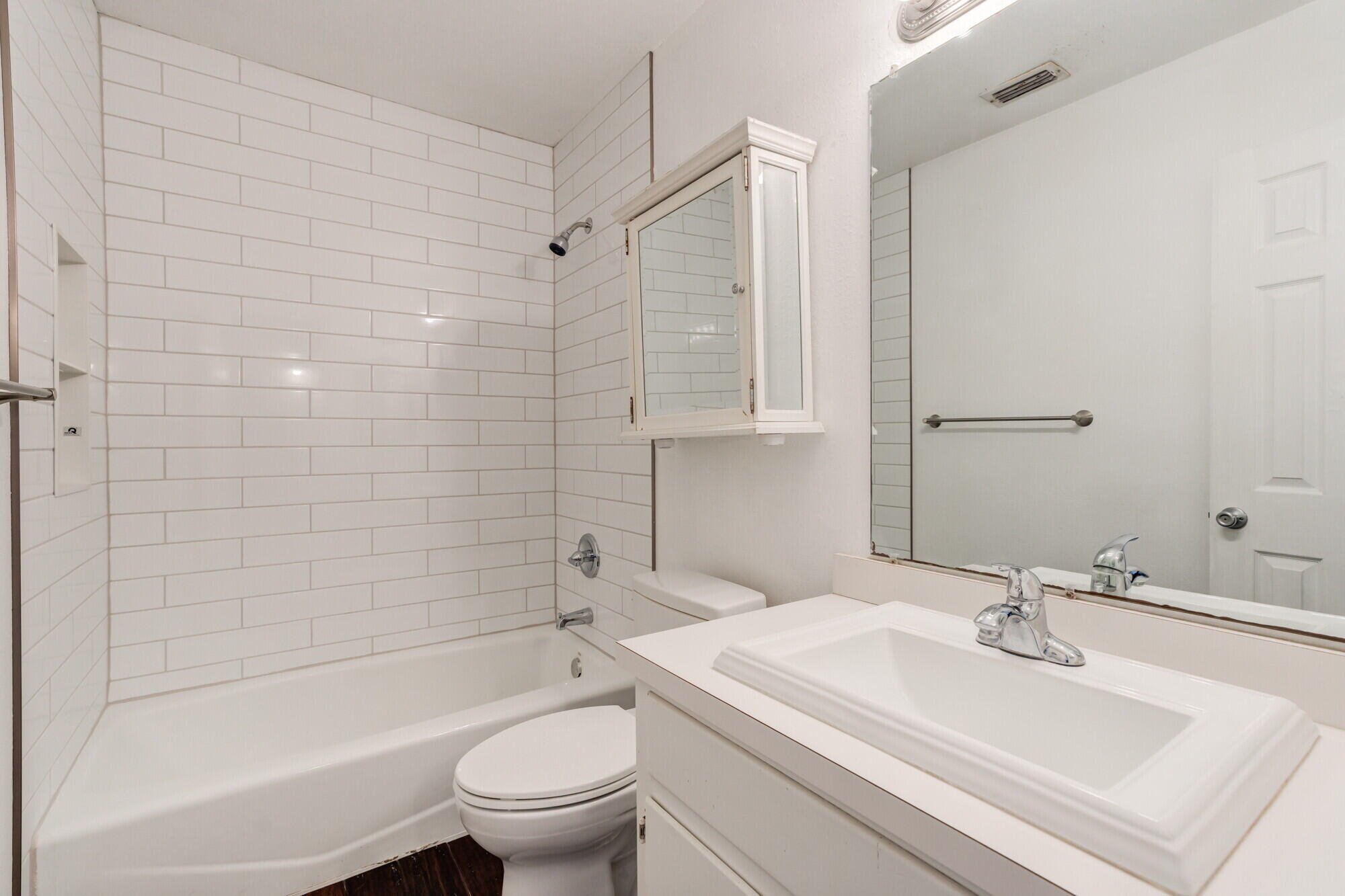 2701 36th Street Lubbock, TX 79413 - Photo 16 of 23 a bathroom with a sink toilet and shower