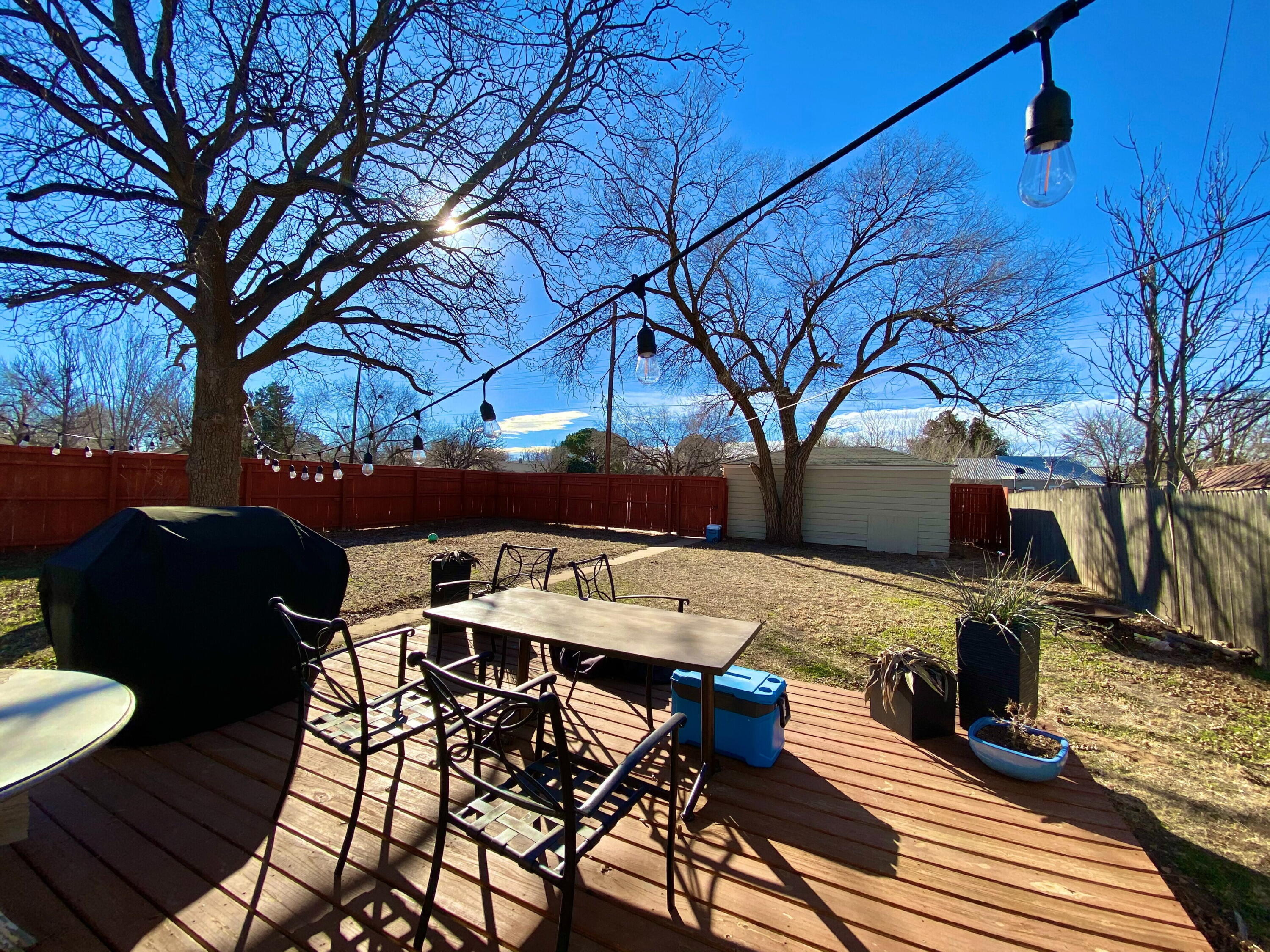 2701 36th Street Lubbock, TX 79413 - Photo 19 of 23 a view of a patio with iron fence