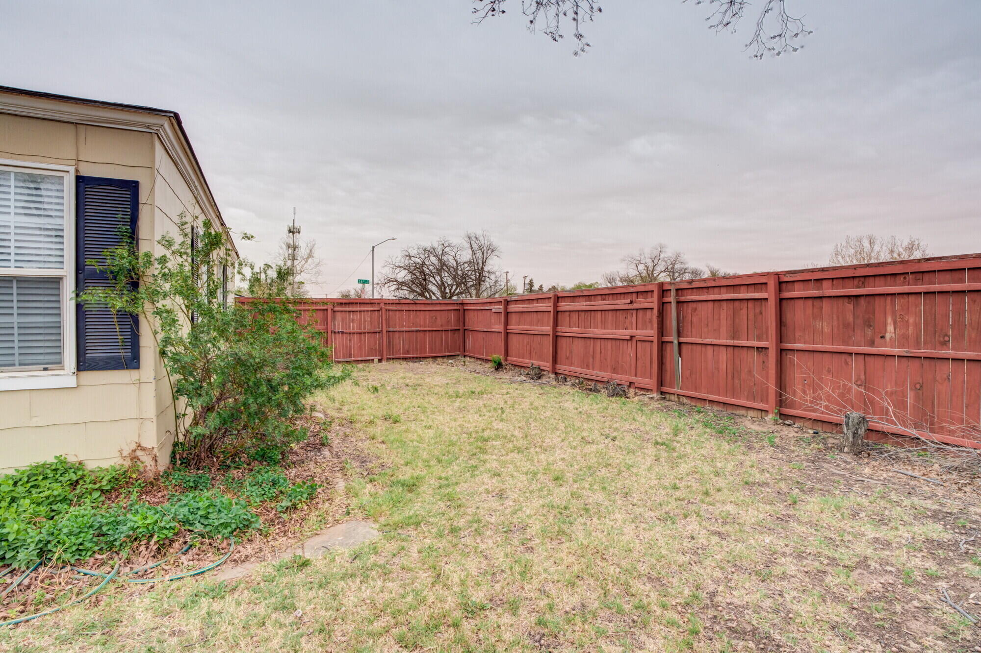 2701 36th Street Lubbock, TX 79413 - Photo 21 of 23 a view of a backyard