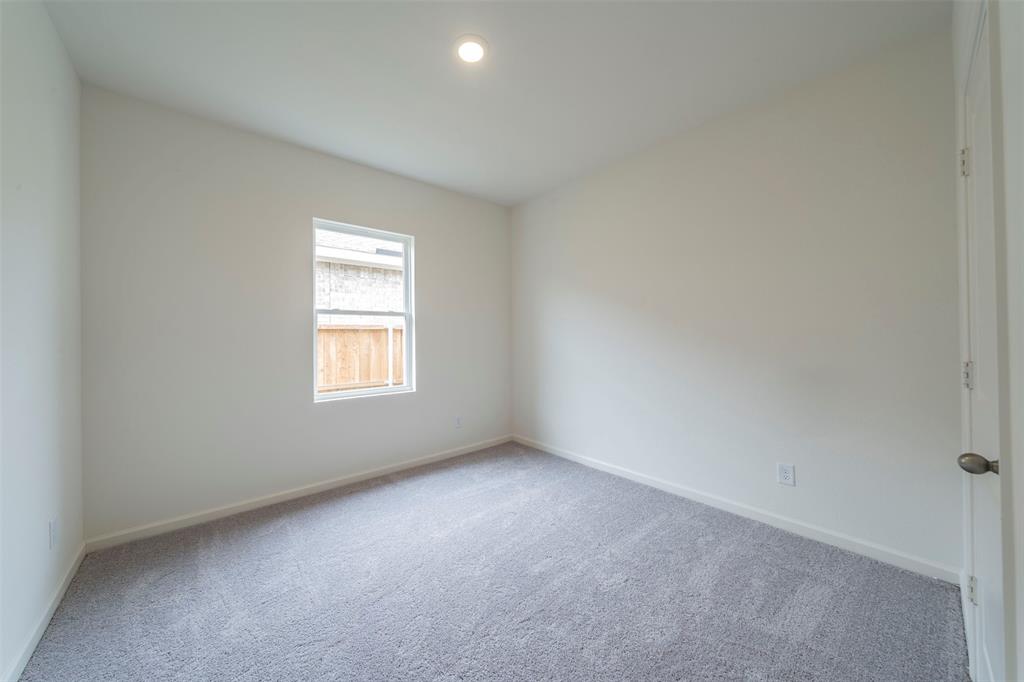 1838 Mccree Street Forney, TX 75126 - Photo 18 of 33 an empty room with a window