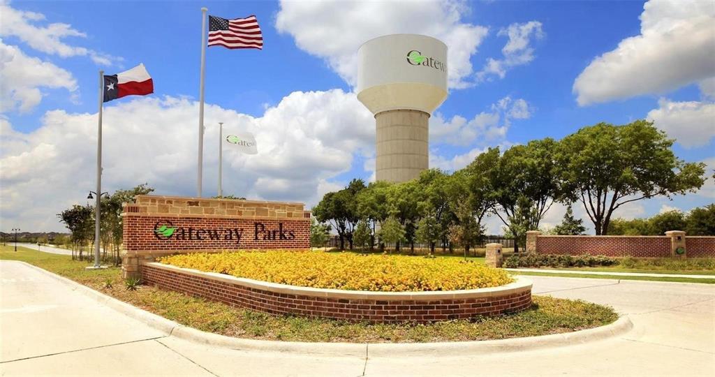 1838 Mccree Street Forney, TX 75126 - Photo 26 of 33 a view of a swimming pool with a yard