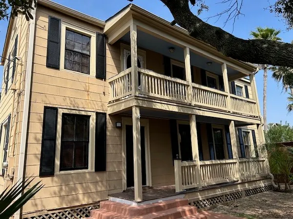 a front view of a house with a garage