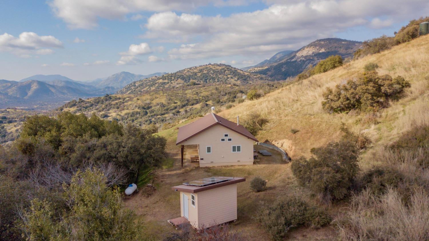 44981 Todd Eymann Road Dunlap, CA 93621 - Photo 11 of 95 a view of a house with a yard and mountain view